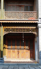 Wall Mural -  Foshan city, China. Xi Qiao Mountain Guoyi Movie and TV City.  The street  depicting Guangzhou street in real size in the early 20th century. Traditional wooden doors. 