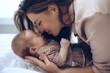 Woman with a baby. Beautiful mother with a baby. High quality photo
