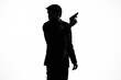 © SHOTPRIME STUDIO - The man in a suit gun in the hands of the emotions silhouette light background