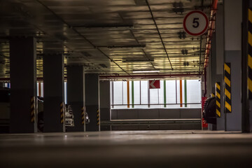 Wall Mural - Parking in a residential building. Covered underground parking for cars