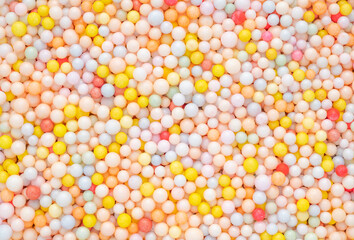 Wall Mural - abstract pink yellow foam beads texture background