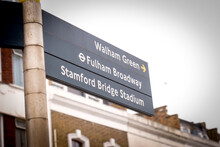 London- Directional Street Sign In West London For  Chelsea FC's Stanford Bridge Stadium And Fulham Broadway Underground Station