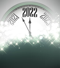 Half Hidden Green New Year Clock Showing 2022.
