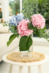 Canvas Print - Bouquet with beautiful hortensia flowers on table in living room