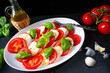 Tomato with mozzarella and basil