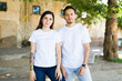 Stylish couple with casual white tees