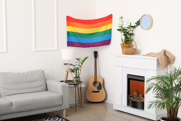 Modern interior of stylish living room with flag of LGBT