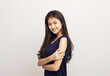 © Chanakon - Vaccination. Young beautiful asian woman getting a vaccine protection the coronavirus. Smiling happy female showing arm with bandage after receiving vaccination. On isolated white background.