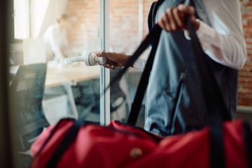 Close-up of courier delivers food at business office.