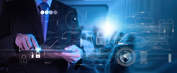 Cyber security and data protection information privacy internet technology concept.Businessman working on modern computer  padlock protecting business and financial data virtual network connection.