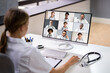 © Andrey Popov - Doctor In Online Medical Video Conference With Diverse Team