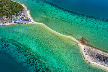 Diep Son island, where a road emerges in the middle of the sea during low tide, Nha Trang, Khanh Hoa, Vietnam. 