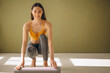 © Petro - Woman with yoga mat practising yoga