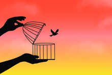 Liberation Symbol. Birds Flying Out Of Cage, Freedom Concept, Bird Set Free, A Bird Flying For Freedom From An Open Cage.