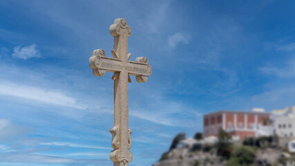 Sticker - White stone cross with the sky on the background