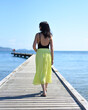 © Tatiana - 45 years old Russian woman walking on pier against Japanese sea