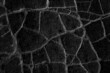 © kichigin19 - black old wall cracked concrete background / abstract black texture, vintage old background