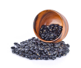 Wall Mural - black beans in wood bowl on white background