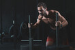 ©  Yistocking - a 40-year-old man doing physical exercise in a gym.