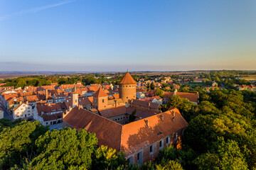 Wall Mural - Castle in Reszel - panorama of the city at sunrise - Warmia and Masuria, Poland