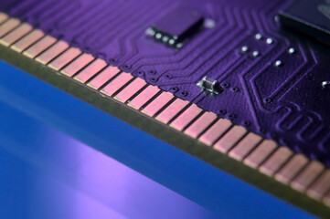 contacts of a microchip of random access memory close-up.