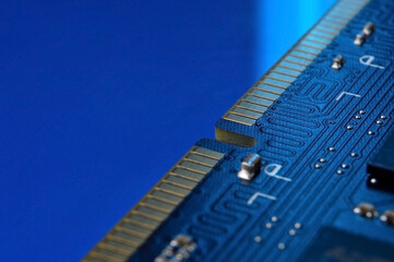 contacts of a microchip of random access memory close-up.