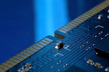 contacts of a microchip of random access memory close-up.