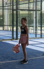 Canvas Print - Young athlete girl from Spain playing tennis on the sports ground