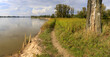 Tourist trail on the bank of the Vistula River being destroyed by erosion, south of Warsaw, Mazovia, Poland