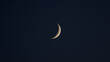 waning crescent Moon on dark sky