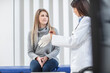© Image Source Limited - Female doctor preparing to examine patient