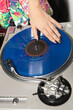 © Image Source Limited - Disc jockey at party on mixing desk
