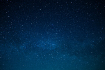 Wall Mural - starry night sky. milky way. twinkling stars. mysterious, majestic beauty, silence. background. text