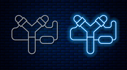 Poster - Glowing neon line Slingshot icon isolated on brick wall background. Vector