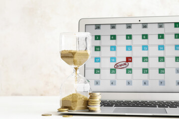 Poster - Hourglass, coins and laptop with calendar on light background. Deadline concept