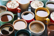 © Pixel-Shot - Cups of tasty coffee on color background