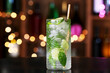 © Pixel-Shot - Glass of tasty mojito on table in bar