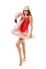 Poster - Young woman with inflatable ring on white background