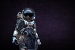 © Sergey Nivens - Astronaut in suit against black background. Space technology concept