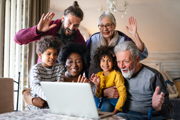 Wall Mural - Portrait of a happy multigenerational multiethnic family at home.