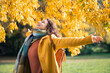 © Rido - Carefree woman feeling free in beautiful autumn colors