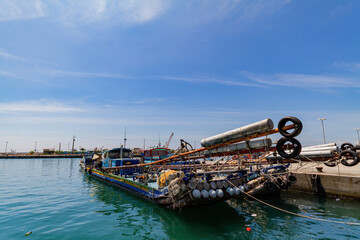 Sticker - View of a vessel at the harbor under the blue sky in Taiwan