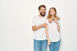 © SHOTPRIME STUDIO - man and woman in white t-shirts are standing next to family light background