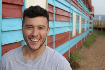 Mixed race young man smiling with space for copy