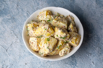 Wall Mural - Potato salad with mustard seeds and mayonnaise (Turkish name; patates salatasi)