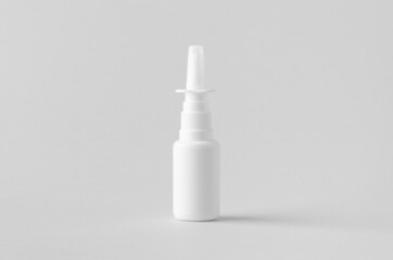 Wall Mural - Nasal spray mockup. White plastic bottle with blank label.