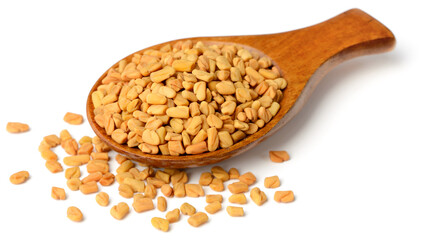 Wall Mural - fenugreek seeds in the wooden spoon, isolated on the white background