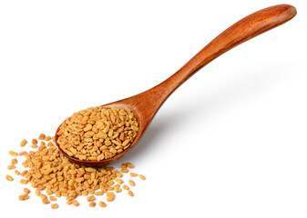 Wall Mural - fenugreek seeds in the wooden spoon, isolated on the white background