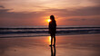 © Panya - Smile Freedom and happiness silhouette woman on beach Summer travel vacation concept Traveler asian teen girl standing on beach at sunset or sunrise in Phuket Thailand