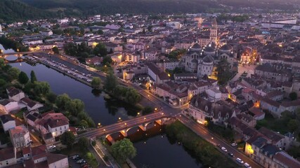 Wall Mural - Aerial view of Perigueux city illuminated at night, Perigord Blanc, Dordogne. High quality 4k footage